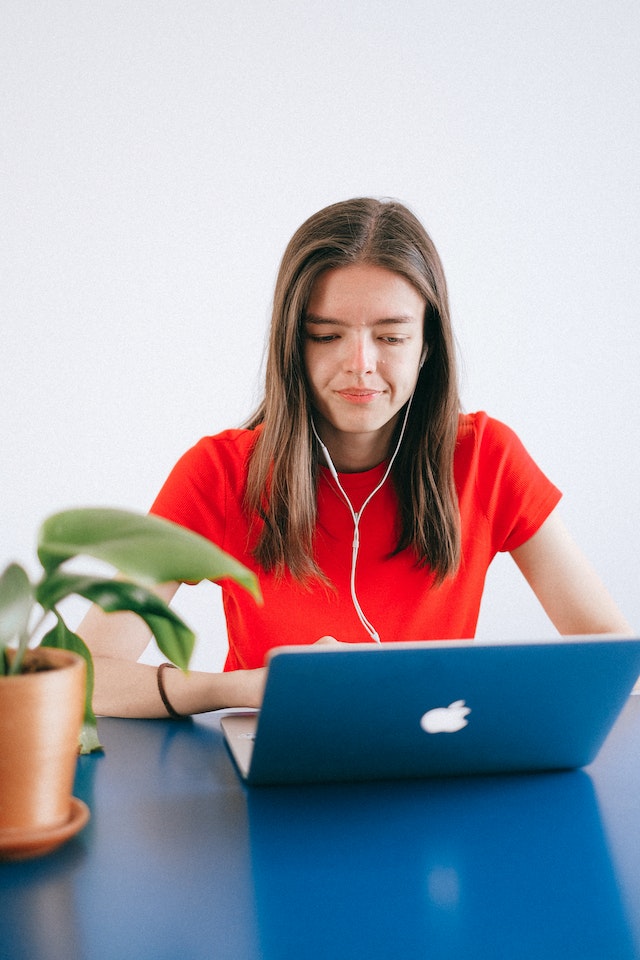 A woman uses an email safelist